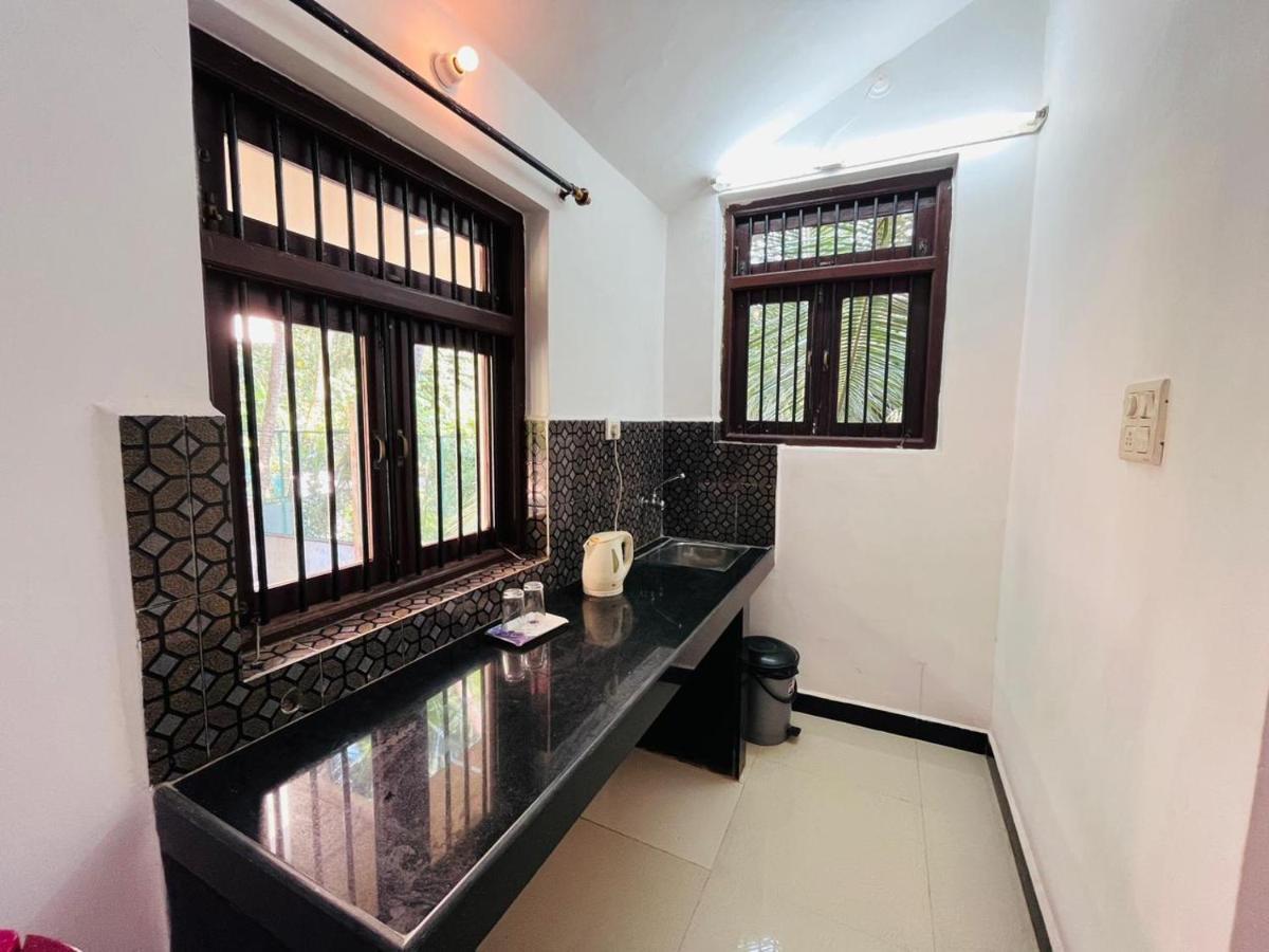 Naga Cottages Morjim Exterior photo
