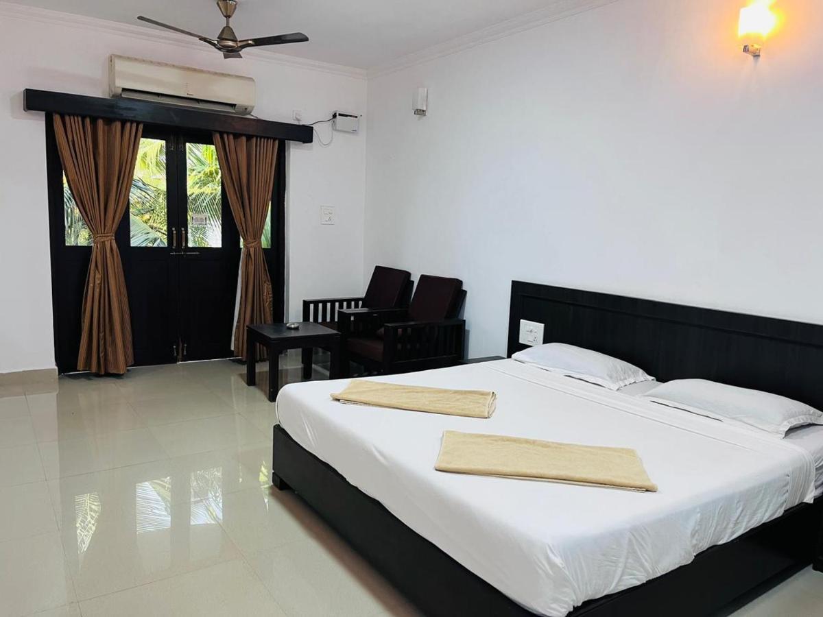 Naga Cottages Morjim Exterior photo