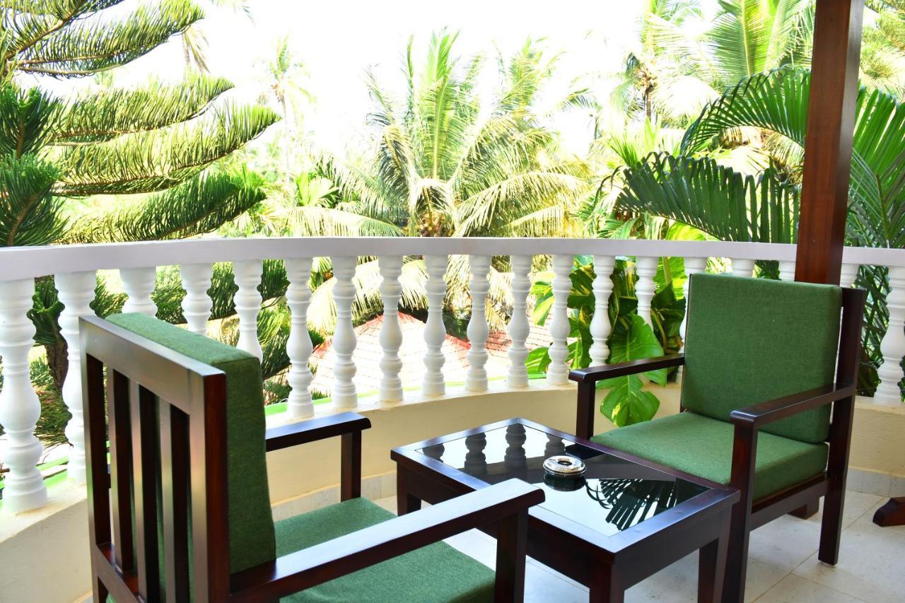 Naga Cottages Morjim Exterior photo